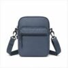 Compact Nylon Crossbody Bag - front view Compact Nylon Crossbody Bag - front view